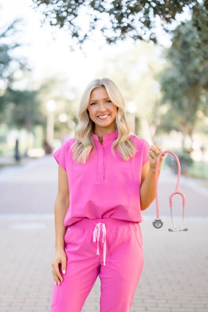 College Station photographer captures Texas A&M graduation session with nursing props