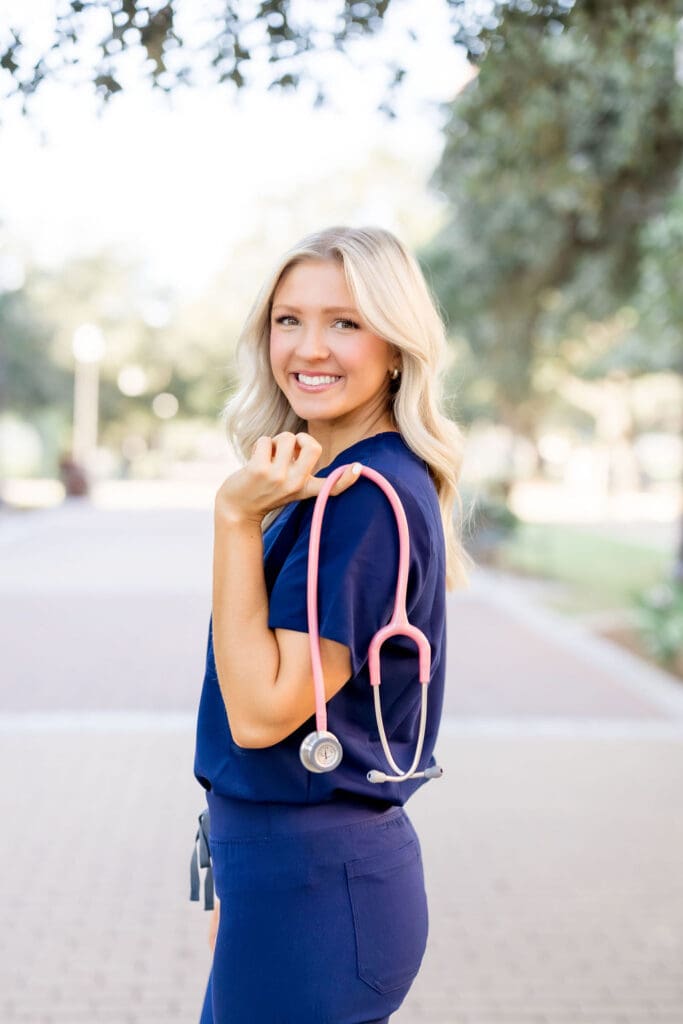 College Station photographer captures Texas A&M graduation session with nursing props