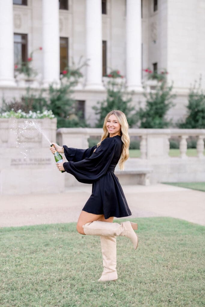 Champagne spray celebration during Texas A&M graduation session