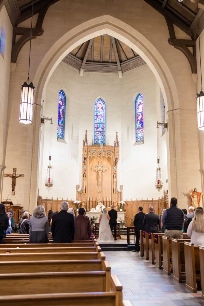 Holy Rosary Catholic Church interior during wedding ceremony in Houston, Texas