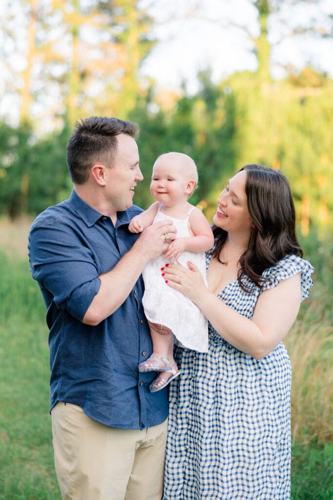 Tomball family photographer captures candid laughter during family photo session at Cy-Hope