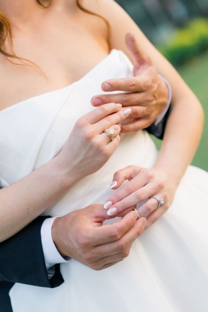 Candid reception moment at Camp Hosea captured by Catholic church wedding photographer Texas