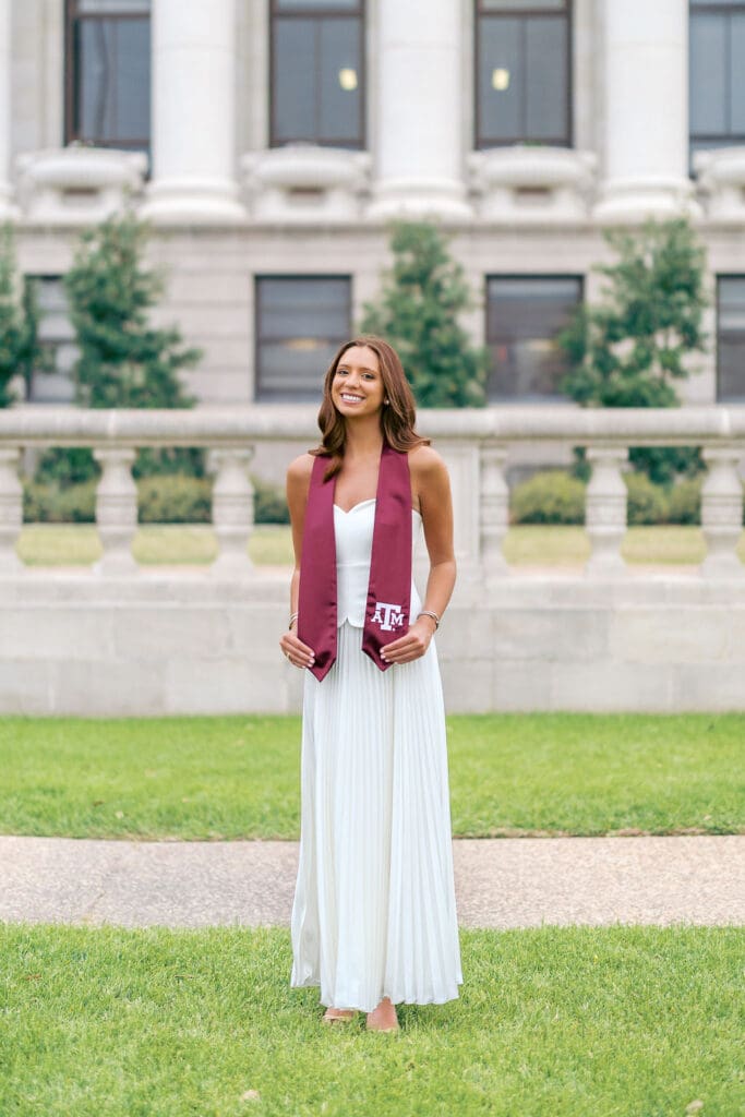 Aggie grad photo location at the Administration Building with columns and classic architecture