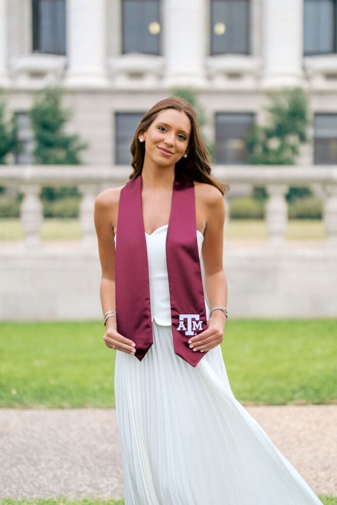 Aggie grad photo location at the Administration Building with columns and classic architecture
