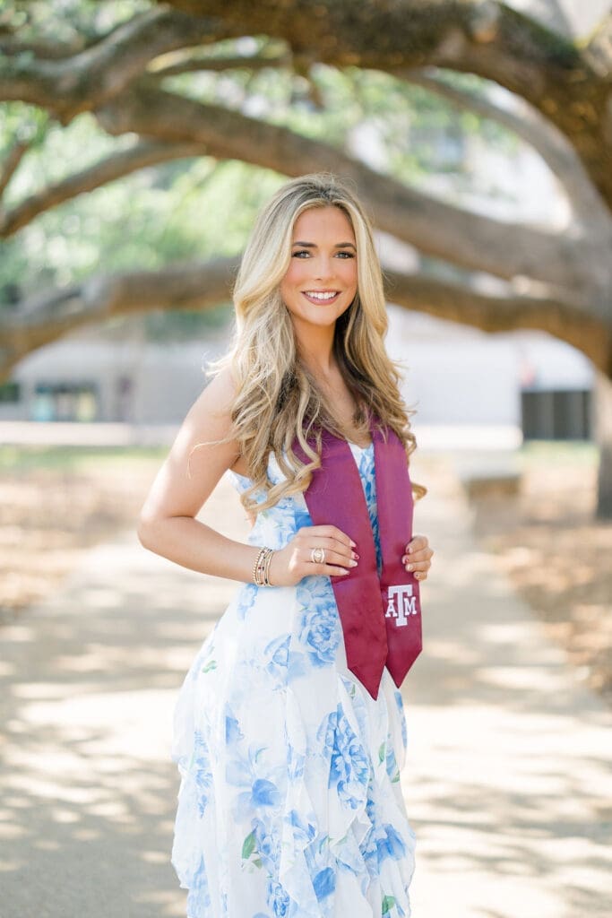 Graduation photo at the Century Tree on Texas A&M campus