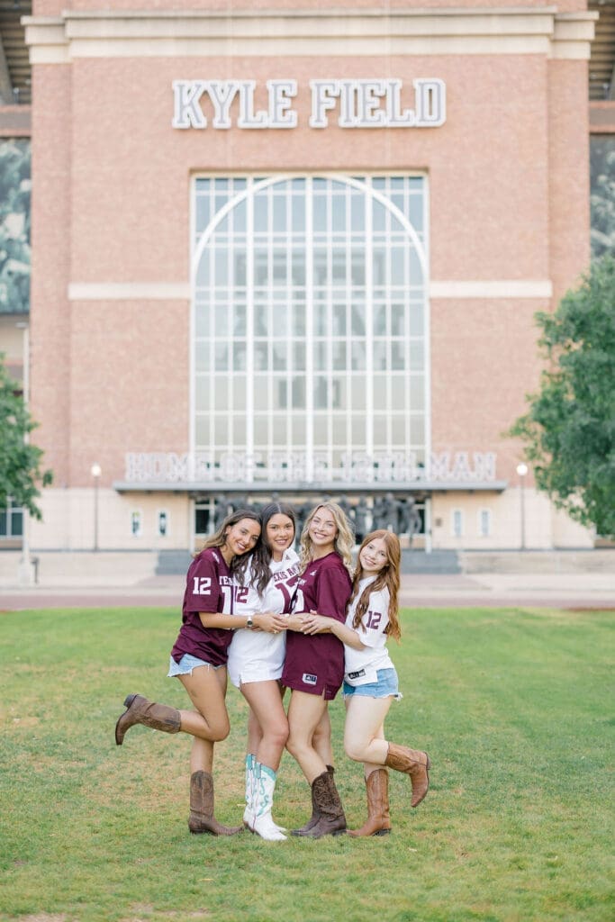 Graduation photo in front of Kyle Field at Texas A&M