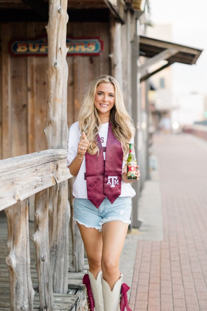 Graduation photo at Northgate’s Dixie Chicken near Texas A&M