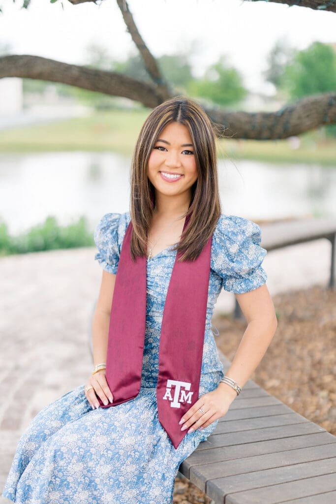 Graduation photo in front of Kyle Field at Texas A&M Aggie Park